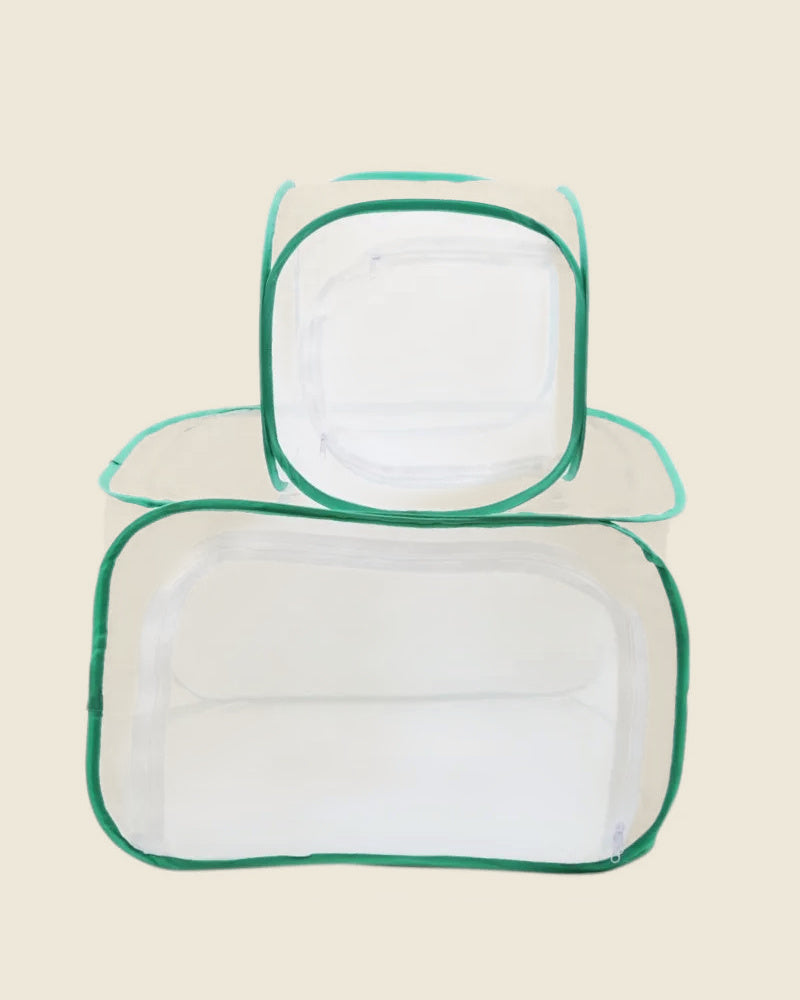 Both mesh cage sizes, the S cube standing on top of the L