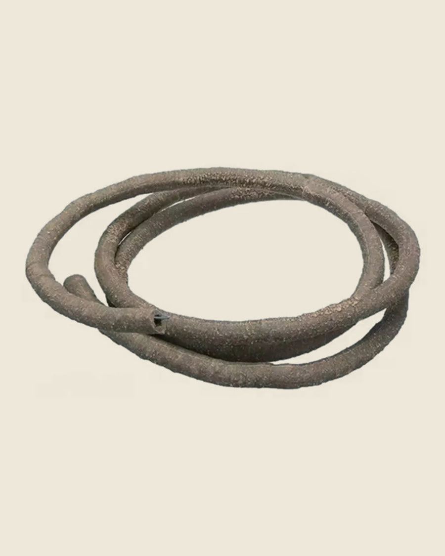 Bendable jungle vine, 39 in, coiled, studio photo